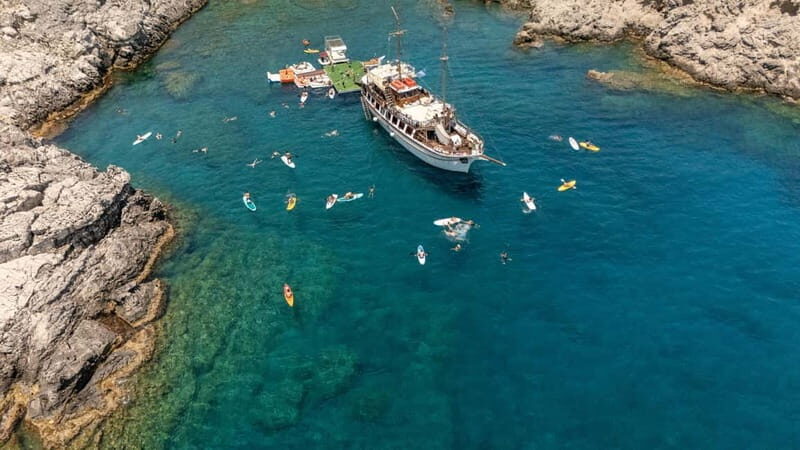Rhodes: Gulet Trip with Food, Drinks, SUP, Kayak & Swimming - Kallithea Thermal Springs: architecture + one last swim before heading back