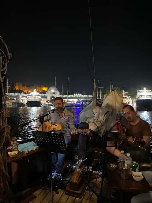 Rhodes: Night Cruise with Live Music and Sightseeing. - Getting In and Out Smoothly: Meeting Point and What to Bring