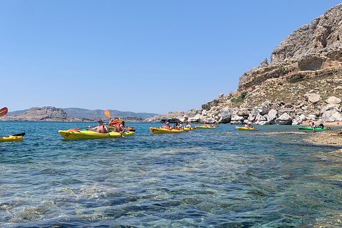Rhodes Sea Kayaking Adventure small groups incl.Transfer & snack - What the sea kayaking feels like: guided paddling plus real breaks