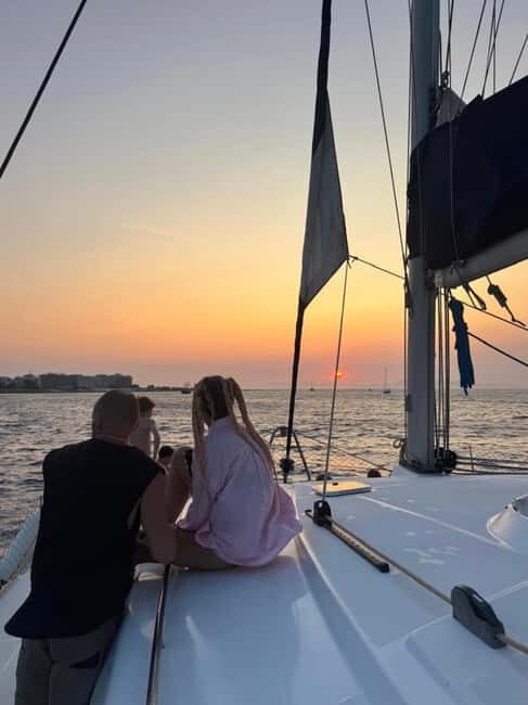 Rhodes: Sunset Catamaran Cruise with Snack, Fruits & Drinks - Sunset Catamaran Basics: Timing, boat vibe, and what $58 buys