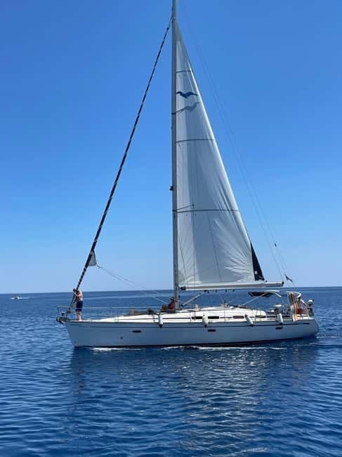 Rhodes: Sunset Catamaran Cruise with Snack, Fruits & Drinks - Weather, Wind Chill, and When Plans Change