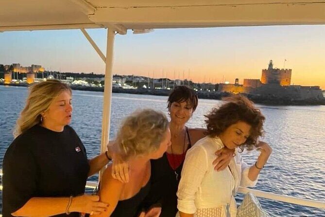 Rhodes Sunset Cruise - Swim and Dine w/ Live Music & Sunset! - Rhodes Sunset Cruise at a glance: what you actually do
