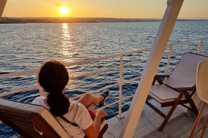 Rhodes Sunset Cruise - Swim and Dine w/ Live Music & Sunset! - Dinner buffet on board: Greek dishes, plus wine