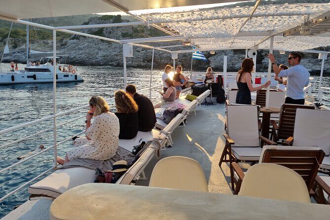 Rhodes Sunset Cruise - Swim and Dine w/ Live Music & Sunset! - Drinks beyond the included wine: plan for the bar