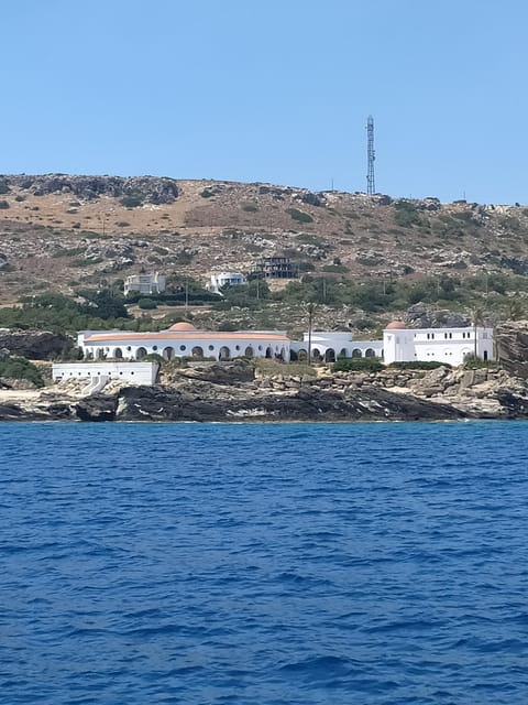 Rhodes: Sunset Cruise to Kallithea with Drinks and Snacks - From Mandraki Harbour to the open coast