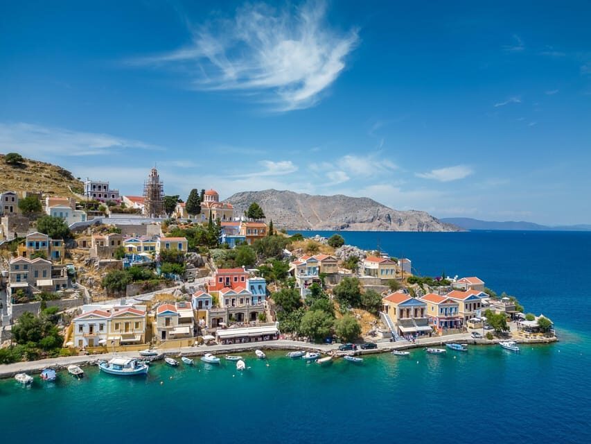 Rhodes: Sunset Cruise to Symi Island with 3 Hours Free Time - Symi mini shrimps and Ouzo: the small local detour that makes it memorable