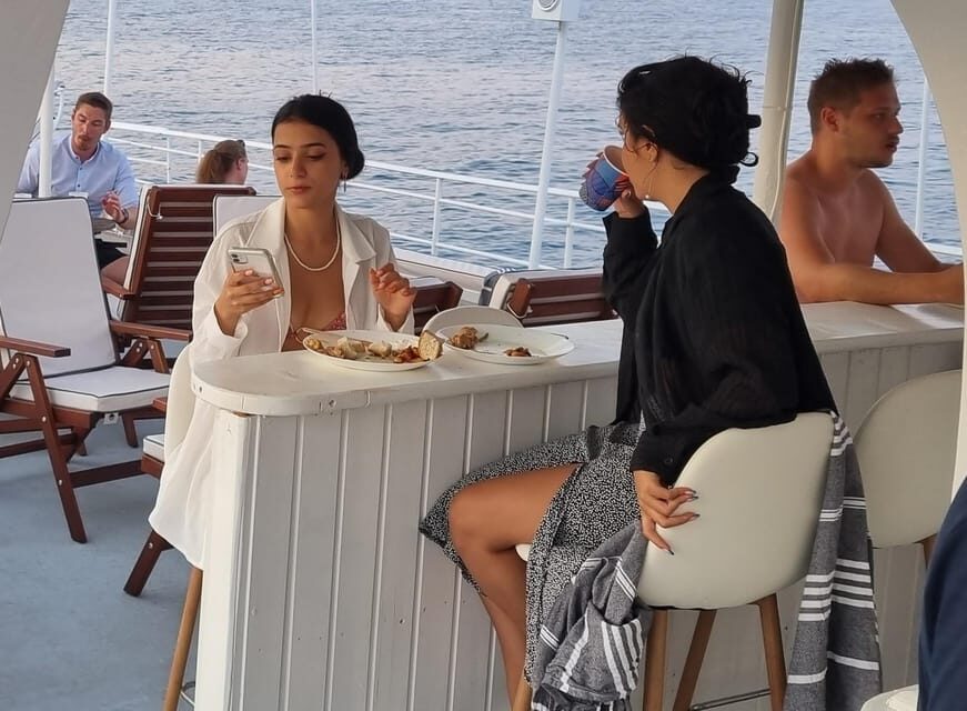 Rhodes: Sunset Cruise with Live Music, Wine & Greek Buffet - Kalithea Springs Bay: the swim, snorkel gear, and the best photos