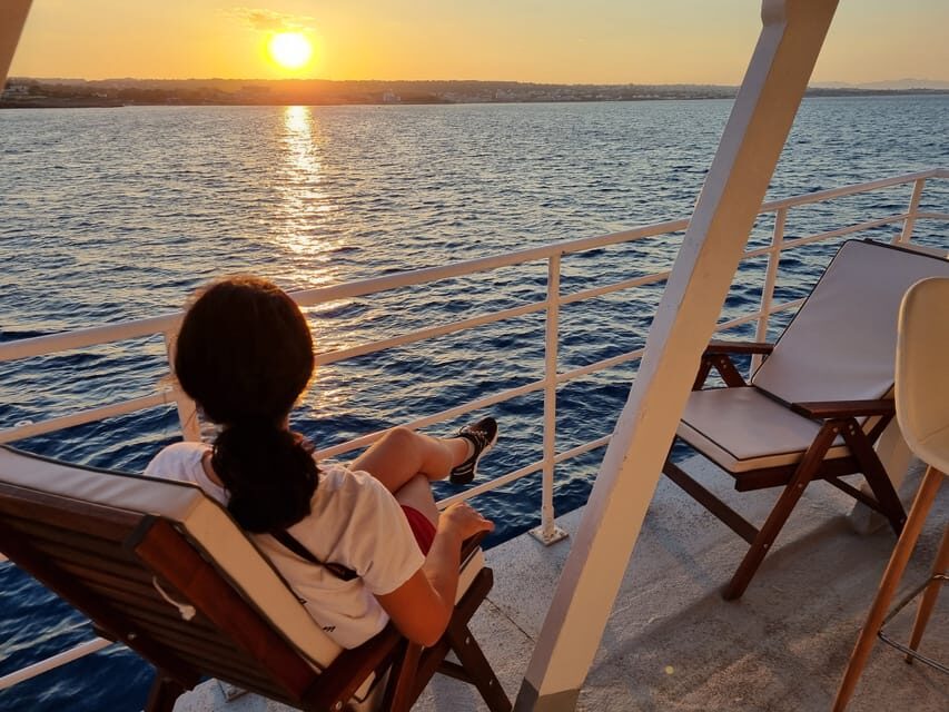 Rhodes: Sunset Cruise with Live Music, Wine & Greek Buffet - Greek dinner buffet onboard: what included food tastes like in practice