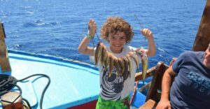 Rhodes Town: Fishing Boat Trip with Fish Meal and Swim Stops - A traditional 10.5-meter boat built for real fishing (Not a party barge)