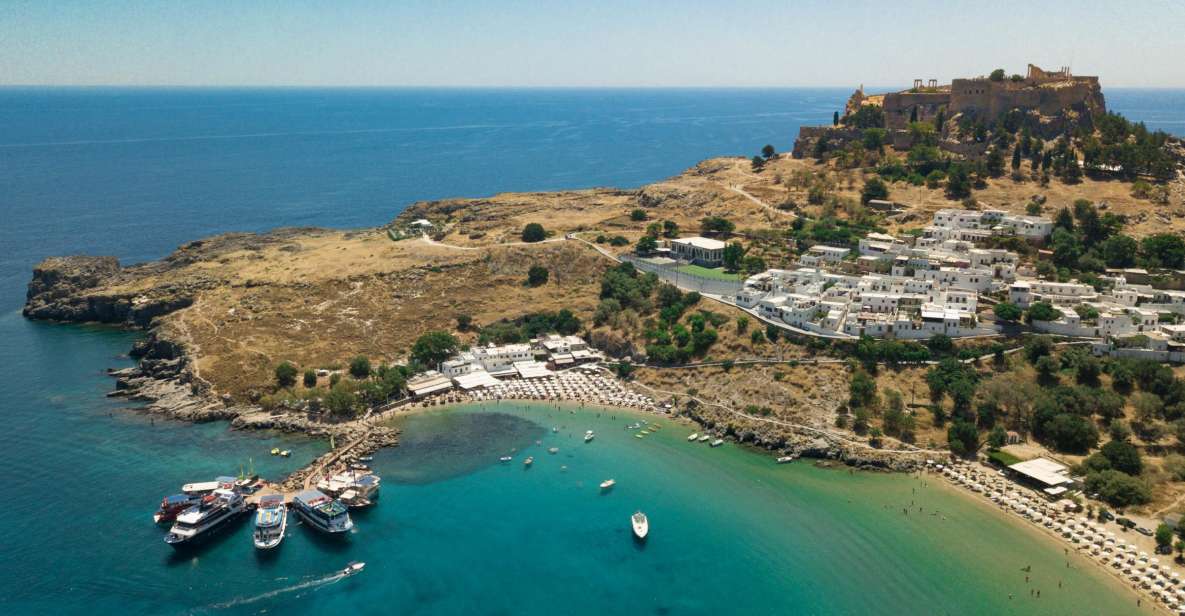 Rhodes Town: Scenic Cruise to Lindos with Swim Stops - Mandraki Port to Anthony Quinn Bay