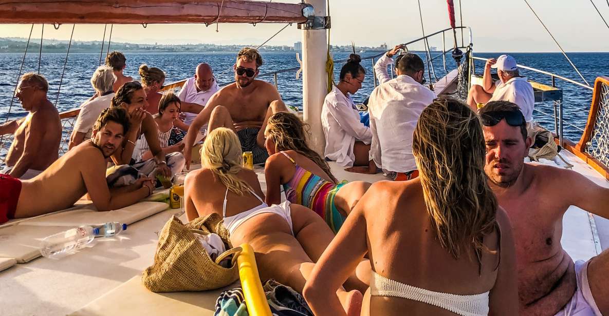 Rhodes Town: Sunset Boat Cruise with Drinks & Snacks - Drinks, snacks, and the cocktail catch