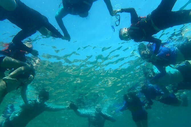 Rina Cave Sea Kayak Tour with Snorkeling and Picnic - What to expect from the guides: Manolis, Christina, and Noah