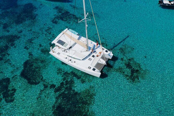 Sail the Athenian Coastline on a Catamaran with Meal & Wine - Stop 1: Nisís Idhroúsa, anchored off a tiny island near Voula