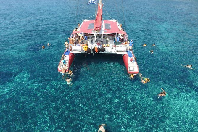Sailing Catamaran Cruise in Santorini with BBQ, Drinks and Transfer - Drinks and BBQ value: included alcohol, not an unlimited bar