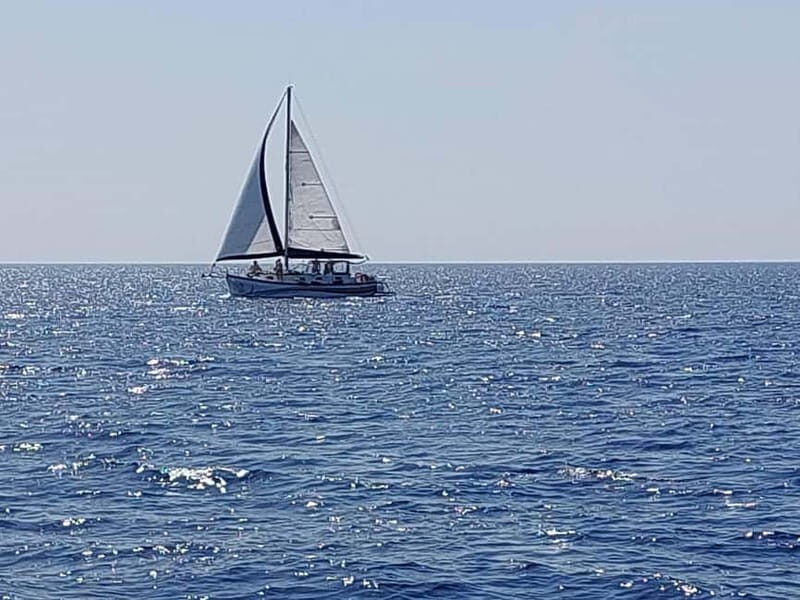 Sailing tour around Lindos with food and drinks - Getting Onboard at the Big Jetty Near Pallas Beach