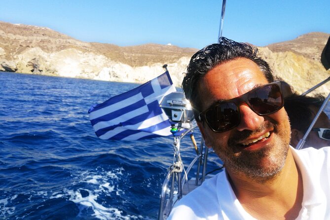 Sailsational Luxury Santorini Catamaran Sunset Cruise with Dinner - White Beach and Santorini’s pale volcanic cliffs