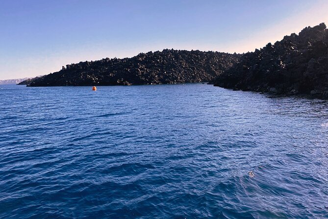 Sailsational Luxury Santorini Catamaran Sunset Cruise with Dinner - The sunset meal is the real centerpiece