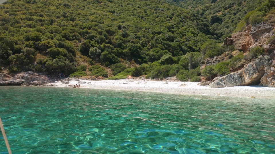 Sami: Ithaca Island Boat Cruise with Swim Stops and Snacks - Filiatro Beach and its rocky shore