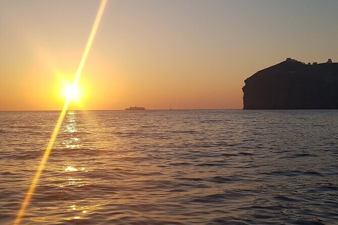 Santorini 5 - Hours Private Day Or Sunset Cruise with Bbq and Drinks - BBQ, mezze, and free wine and beer: what “included” actually means for your day