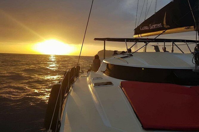 Santorini Adventurous Catamaran Experience with Snorkeling - Sailing past Palea Kameni and around the volcano