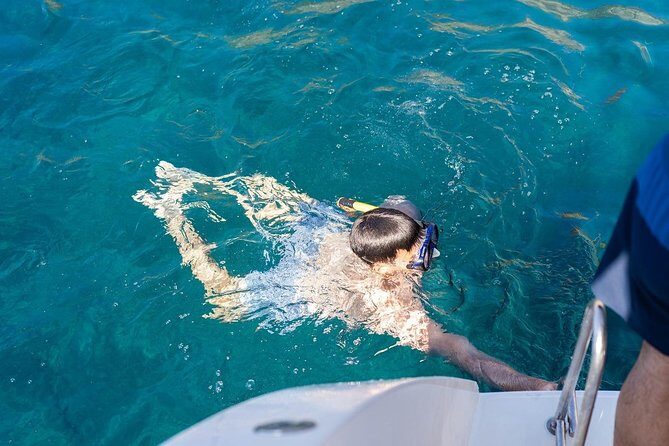Santorini Adventurous Catamaran Experience with Snorkeling - BBQ lunch or dinner, plus wine and soft drinks