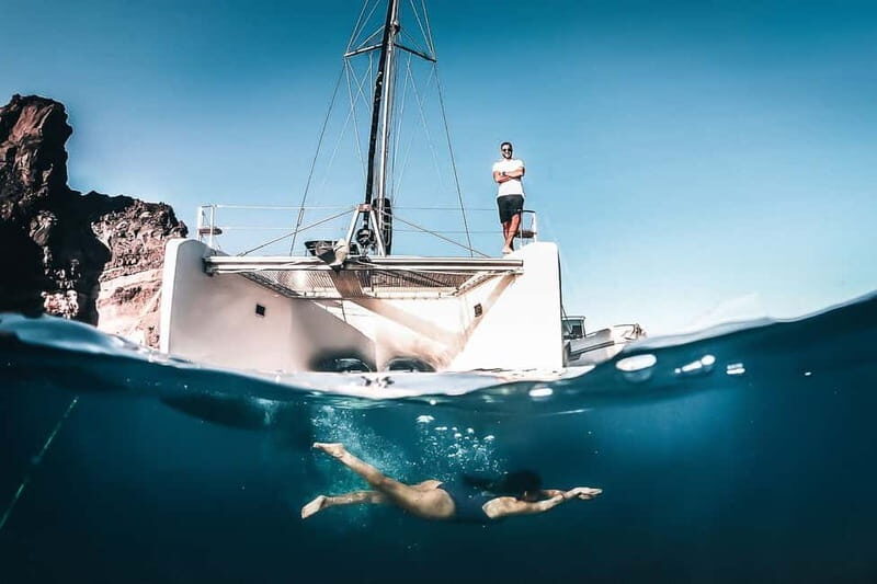 Santorini: All-Inclusive Private Catamaran Experience - Red Beach and White Beach pass-bys: quick photo wins, minimal fuss