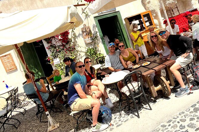Santorini ATV-Quad Experience: Off-Road Adventure & Hotel Pickup - Through vineyards toward windmills, plus a village approach