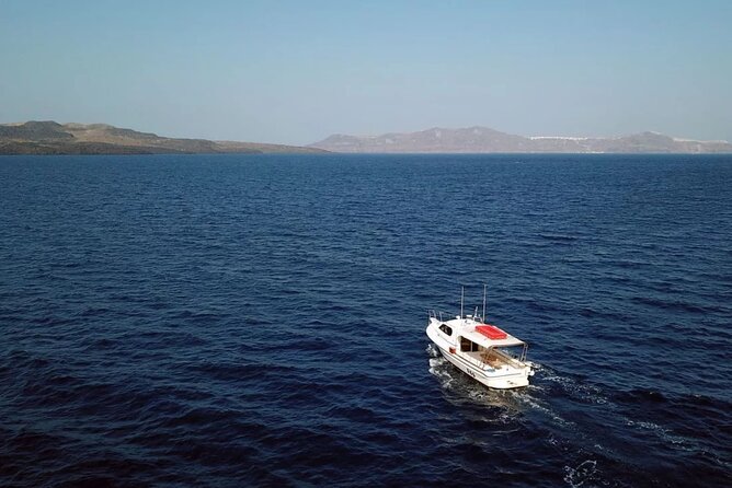 Santorini: Boat tour to Volcano, Hot Springs & Thirasia island - Starting below Fira at the Old Harbor