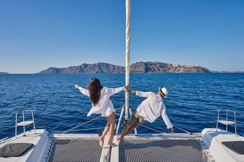 Santorini: Caldera Classic Catamaran Cruise w/ Meal & Drinks - The calm start: hotel pickup to Vlichada Marina, then straight onto the water