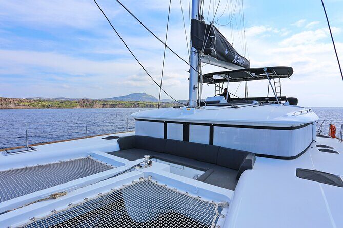 Santorini: Caldera Classic Semi-Private Cruise with BBQ & Drinks - Mesa Pigadia: black-sand swimming in a more private-feeling pocket