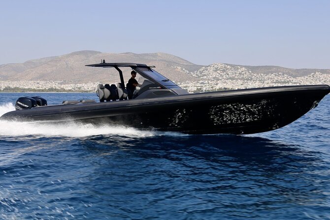 Santorini Caldera: Private Cruise with Speed Boat & Open Bar - Passing Palea Kameni and the caldera cliffs