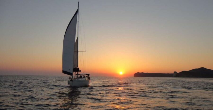 Santorini Caldera: Sunset Sailing Cruise with Meal - Red Beach and White Beach: the quick stops that still deliver