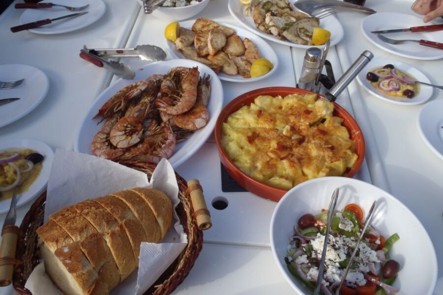 Santorini Caldera: Sunset Sailing Cruise with Meal - Kameni hot-spring time: volcano swimming with dinner in the mix