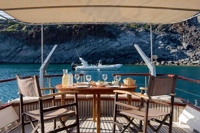 Santorini Caldera Sunset Traditional Cruise with Meal and Drinks - Ammoudi Bay start: where the day’s views begin fast