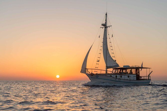 Santorini Caldera Sunset Traditional Cruise with Meal and Drinks - Thirassia swim and snorkel: fishermen’s island + lunch onboard