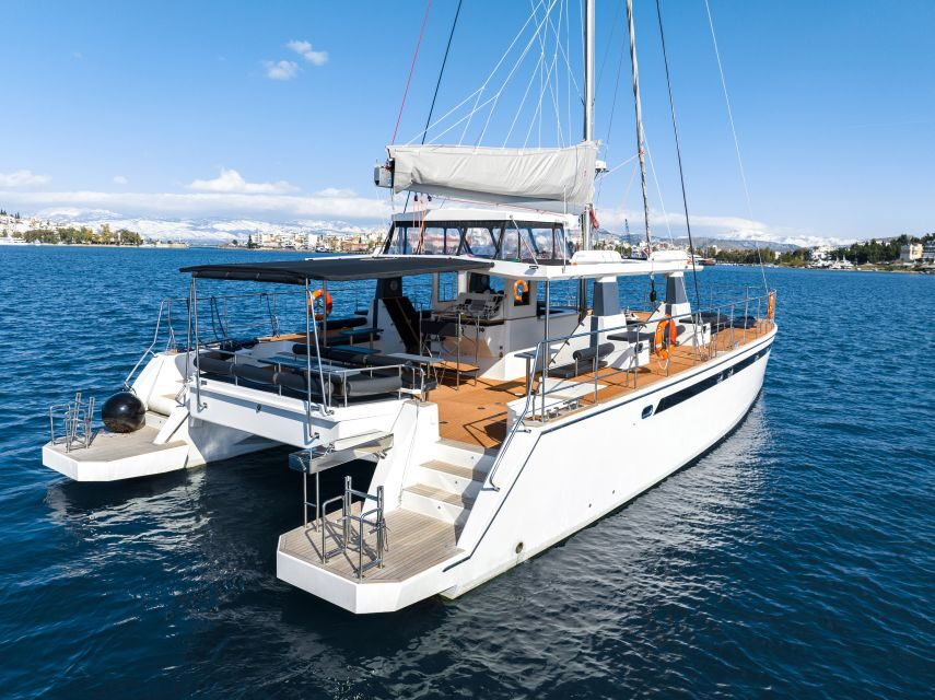 Santorini: Catamaran Caldera Cruise with Meal and Drinks - Pickup that actually works: from your hotel to the dock