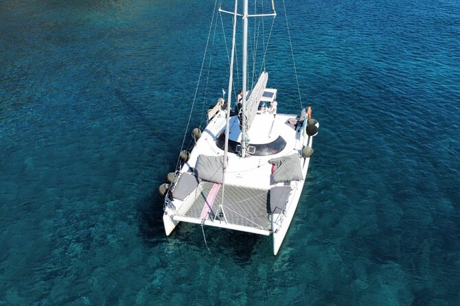 Santorini Catamaran Cruise – 5-Hour Private Sailing Experience - Red Beach: a striking first swim