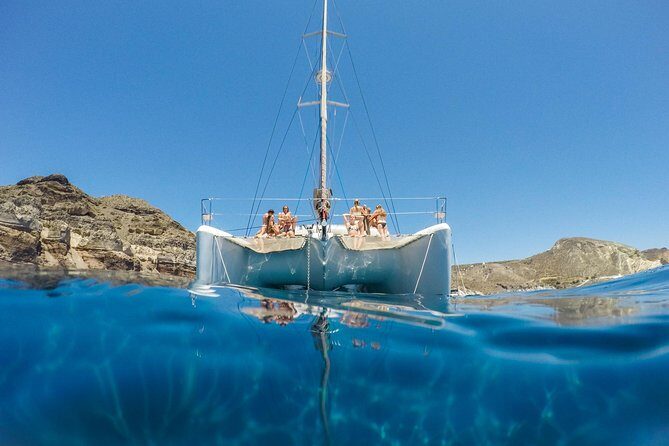 Santorini Catamaran Cruise with Fresh Meal and Open Bar - Vlychada pickup and boarding: getting on the boat without stress