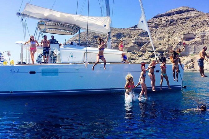 Santorini Catamaran Cruise with Fresh Meal and Open Bar - Group size, vibe, and motion comfort (so you choose wisely)