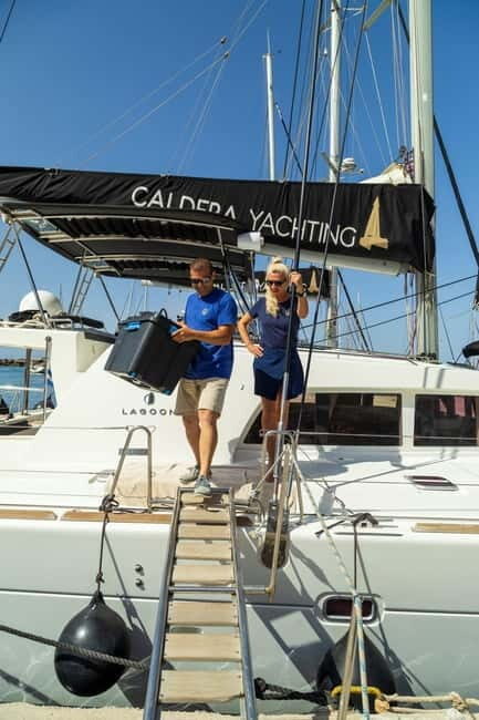 Santorini: Catamaran Cruise with Fresh Meal & Open Bar - Red and White Beach: photos, first impressions, and easy water time