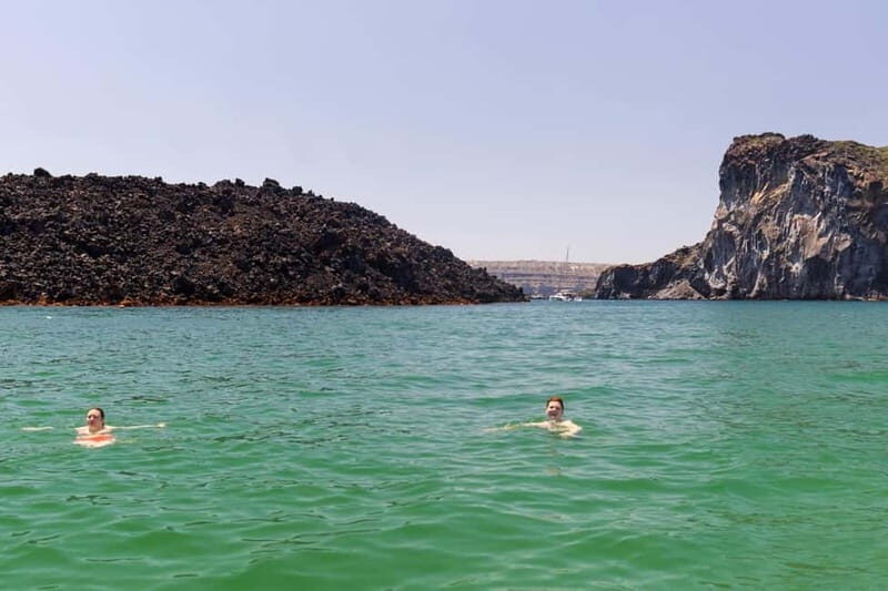 Santorini: Catamaran Cruise with Fresh Meal & Open Bar - Black Mountain coves and snorkeling setup you can actually use