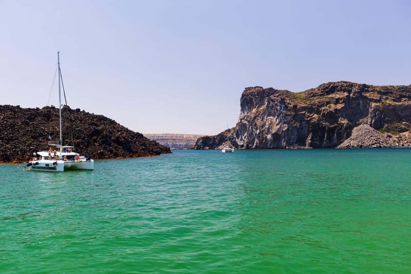 Santorini: Catamaran Cruise with Fresh Meal & Open Bar - Volcanic hot springs: sulphuric coves and a realistic expectation