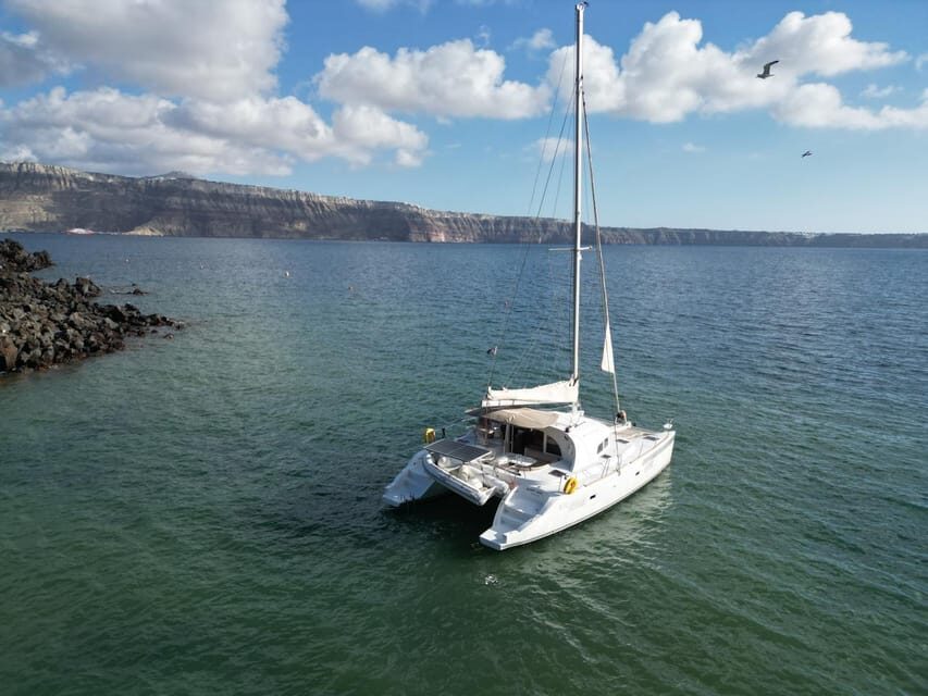Santorini: Catamaran Cruise with Greek BBQ and Drinks - Key highlights that shape the whole day