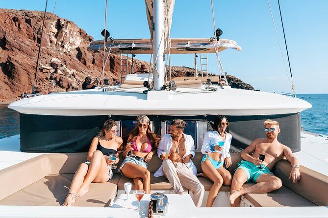 Santorini Catamaran Cruise: with Lunch, BBQ, Open Bar, Transfers - Key highlights at a glance