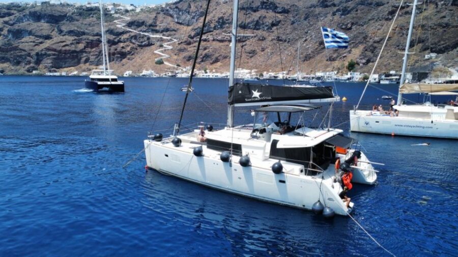 Santorini: Catamaran Cruise with Lunch, Drinks, & Oia Visit - Palea Kameni hot springs: a swim with a story