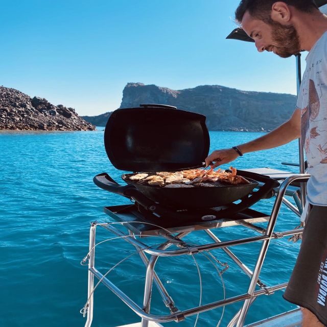 Santorini: Catamaran Cruise with Lunch, Drinks, & Oia Visit - White Beach and Red Beach: swim time beats sand time