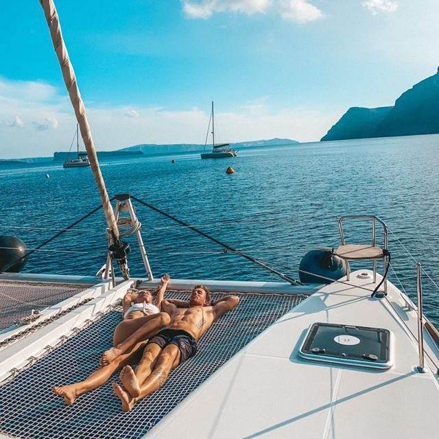 Santorini: Catamaran Cruise with Meal & Open Bar - Sunset From the Caldera: The End of the Day Hits Hard