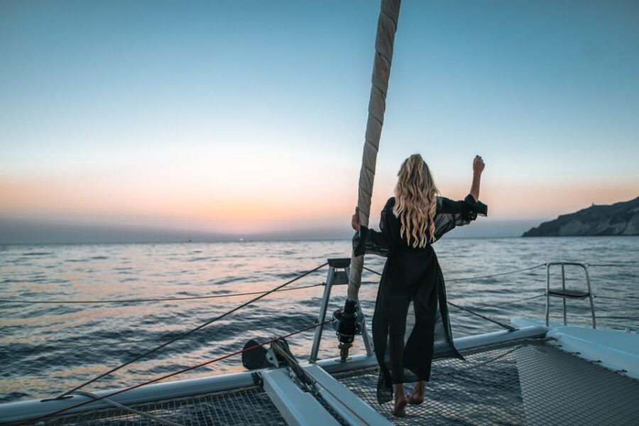 Santorini: Catamaran Cruise with Meal & Open Bar - Red Beach Swim Stop: Volcanic Color Meets Crystal Water