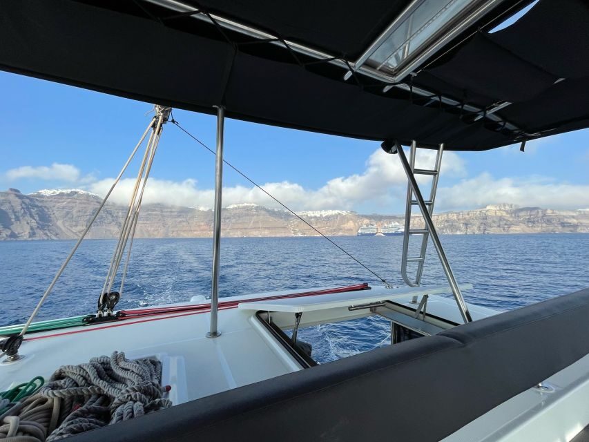 Santorini Catamaran Cruise with Swimming, Meal and Open Bar - Crew energy, safety basics, and comfort when the weather turns