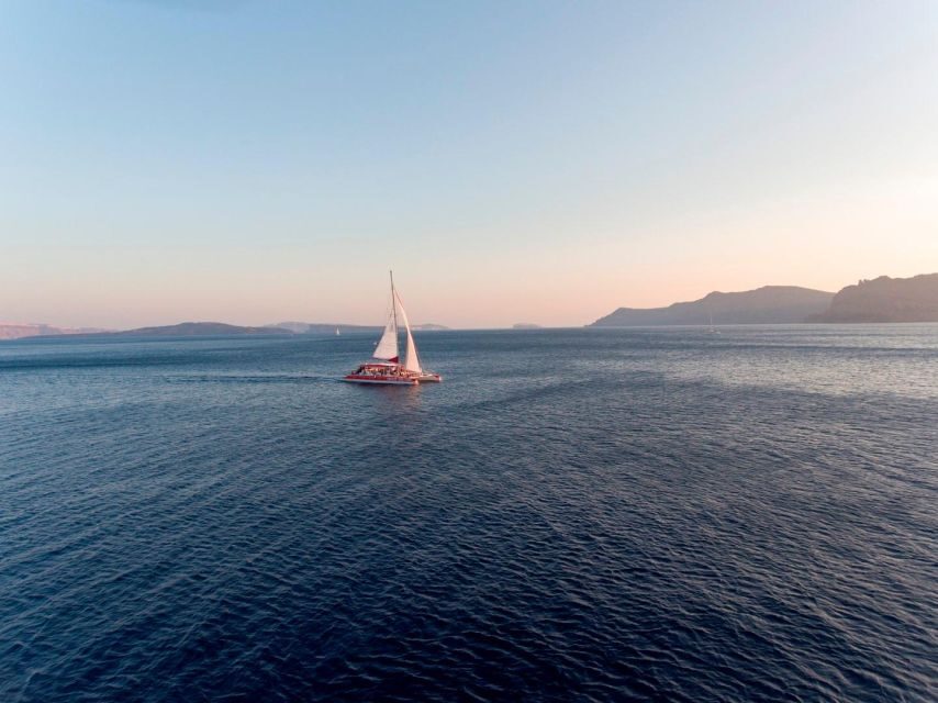 Santorini: Cruise Catamaran with BBQ & Drinks Day or Sunset - Nea Kameni hot springs: a quick start with real water appeal